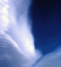 image of cirrus clouds - crescent moon